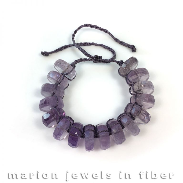 Amethyst Big Beads Bracelet - Knotted and braided nylon cord with amethyst beads, 16 mm wide beads, one size fits all with sliding closure - $59. Amethyst Big Beads Bracelet - Knotted and braided nylon cord with amethyst beads, 16 mm wide beads, one size fits all with sliding closure - $59.